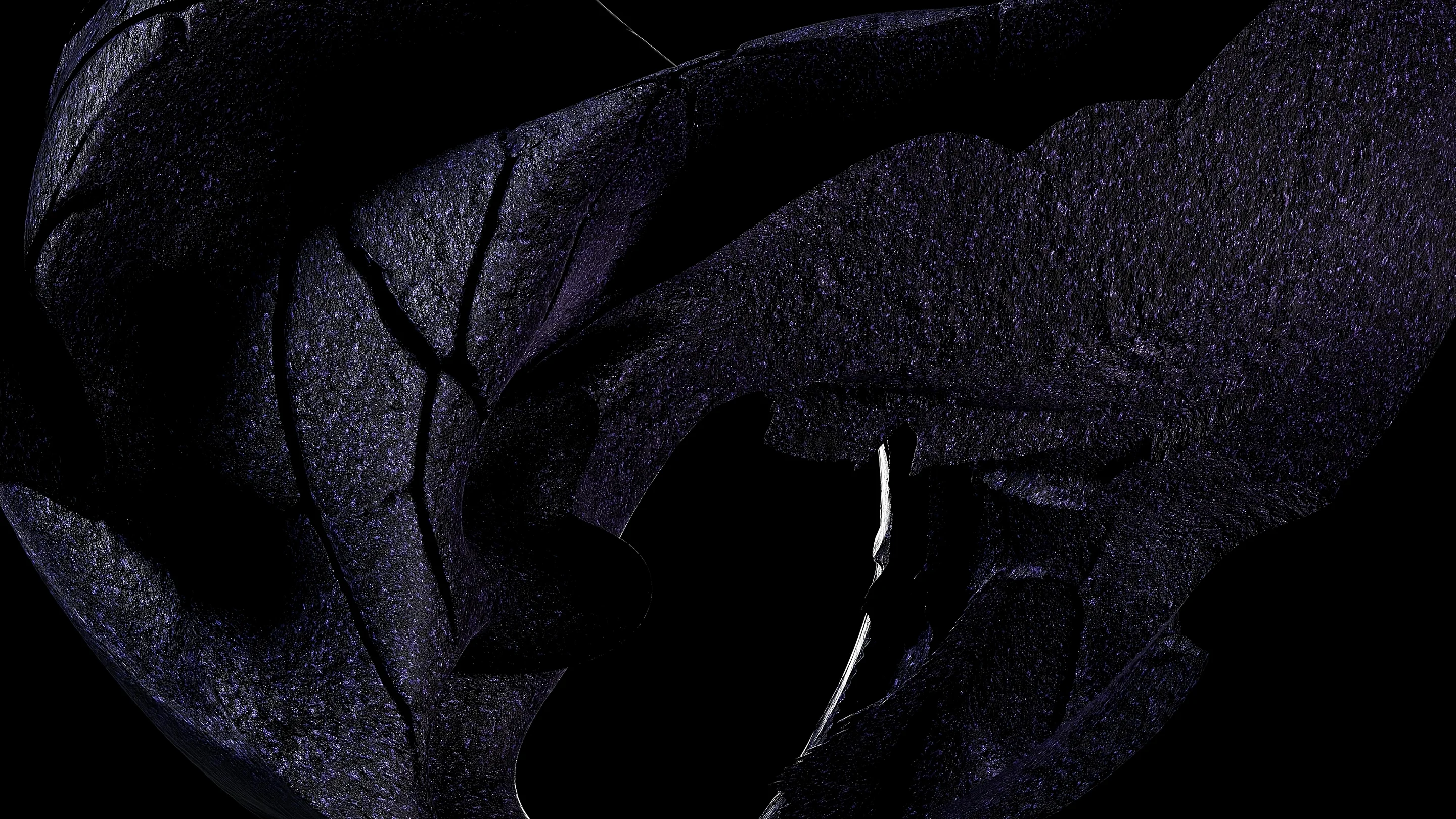 Dark violet sculptural folds with a granular surface against black